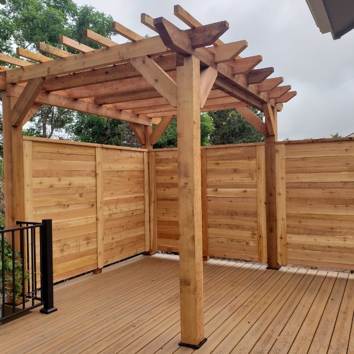 Wooden Pergola Attached to Wooden Wall