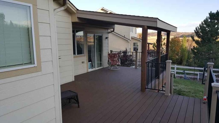 A deck with a railing. 